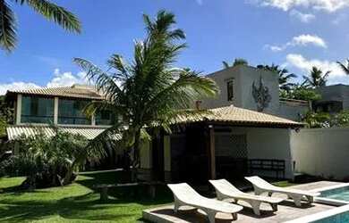 Imagem: A casa possui 5 Dormitórios, 5 Banheiros, 4 Vagas na garagem