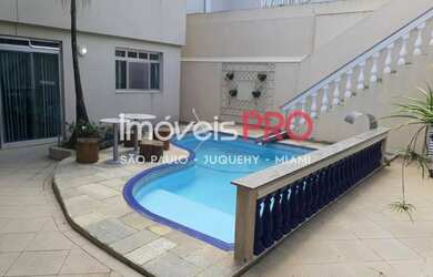 Imagem: A casa possui 4 Dormitórios, 5 Banheiros, 5 Vagas na garagem