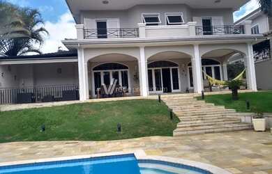 Imagem: A casa em condomínio possui 4 Dormitórios, 5 Banheiros, 3