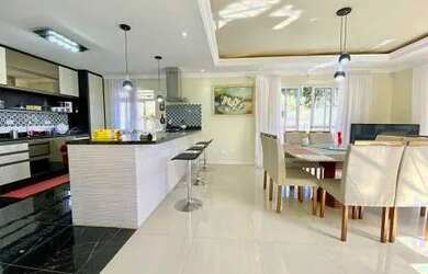 Imagem: A casa em condomínio possui 4 Dormitórios, 2 Banheiros, 4