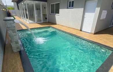 Imagem: A casa em condomínio possui 4 Dormitórios, 5 Banheiros, 3