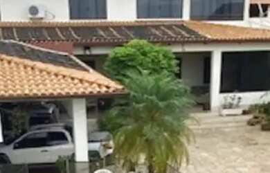 Imagem: A casa possui 5 Dormitórios, 5 Banheiros, 5 Vagas na garagem