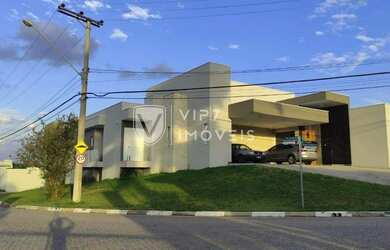 Imagem: A casa em condomínio possui 4 Dormitórios, 5 Banheiros, 4