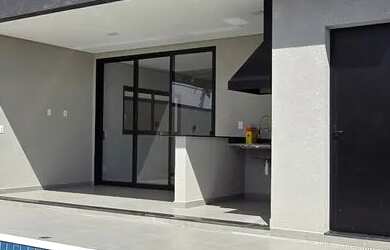 Imagem: A casa possui 3 Dormitórios, 5 Banheiros, 4 Vagas na garagem