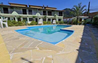 Imagem: A casa possui 2 Dormitórios, 1 Banheiro, 1 Vaga na garagem