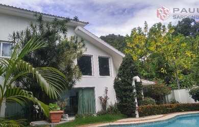 Imagem: A casa possui 4 Dormitórios, 1 Banheiro, 4 Vagas na garagem