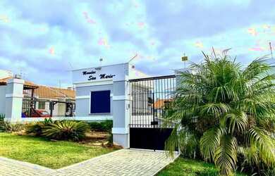 Imagem: A casa possui 3 Dormitórios, 1 Banheiro, 2 Vagas na garagem