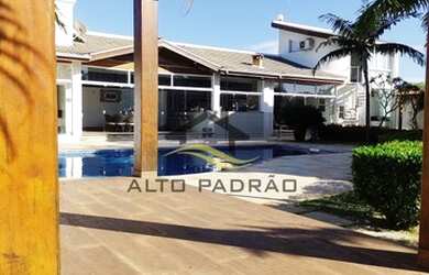 Imagem: A casa em condomínio possui 5 Dormitórios, 4 Banheiros, 2