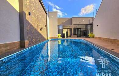 Imagem: A casa possui 3 Dormitórios, 3 Banheiros, 3 Vagas na garagem