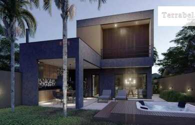 Imagem: A casa possui 3 Dormitórios, 4 Banheiros, 2 Vagas na garagem