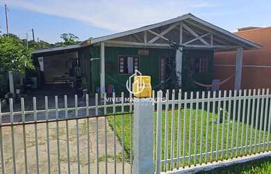 Imagem: A casa possui 2 Dormitórios, 2 Banheiros, 2 Vagas na garagem