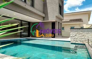 Imagem: A casa em condomínio possui 4 Dormitórios, 5 Banheiros, 5