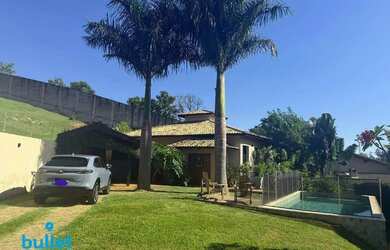 Imagem: A casa possui 3 Dormitórios, 3 Banheiros, 3 Vagas na garagem