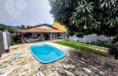 Imagem: A casa possui 3 Dormitórios, 4 Banheiros, 170m² de Área e