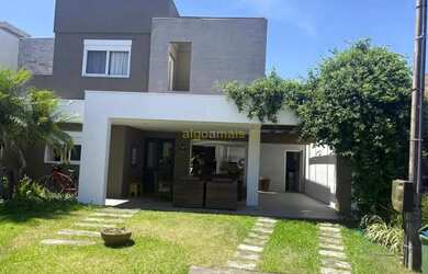 Imagem: A casa em condomínio possui 5 Dormitórios, 5 Banheiros, 2