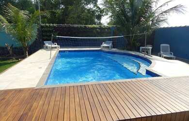 Imagem: A casa possui 2 Dormitórios, 5 Vagas na garagem e está localizado