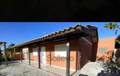 Imagem: A casa possui 4 Dormitórios, 2 Banheiros, 3 Vagas na garagem