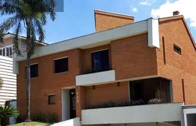 Imagem: A casa em condomínio possui 4 Dormitórios, 5 Banheiros, 5