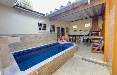 Imagem: A casa possui 2 Dormitórios, 3 Banheiros, 2 Vagas na garagem