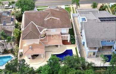 Imagem: A casa em condomínio possui 4 Dormitórios, 5 Banheiros, 4