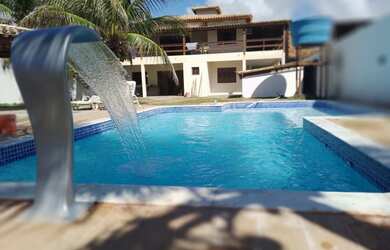 Imagem: A casa possui 5 Dormitórios, 5 Vagas na garagem e está localizado