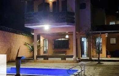 Imagem: A casa possui 4 Dormitórios, 4 Banheiros, 3 Vagas na garagem