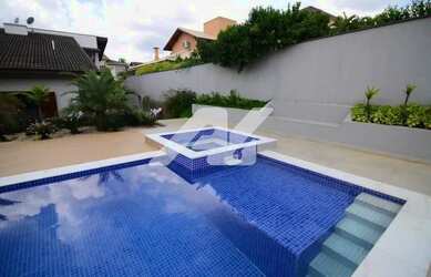 Imagem: A casa em condomínio possui 4 Dormitórios, 5 Banheiros, 5