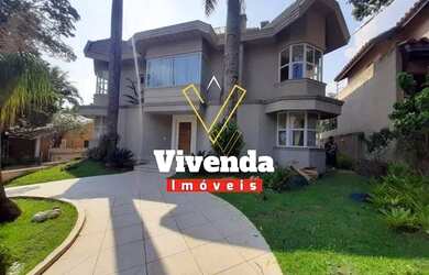 Imagem: A casa em condomínio possui 4 Dormitórios, 5 Banheiros, 5