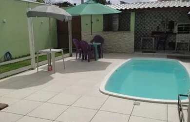 Imagem: A casa possui 3 Dormitórios, 2 Vagas na garagem e está localizado