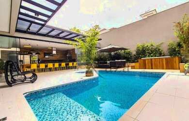 Imagem: A casa em condomínio possui 4 Dormitórios, 5 Banheiros, 4