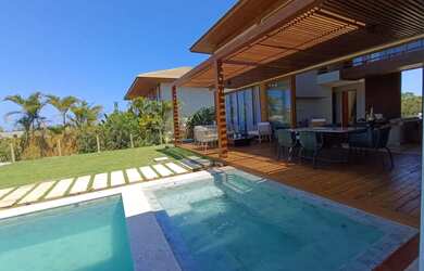 Imagem: A casa em condomínio possui 5 Dormitórios, 5 Banheiros, 4