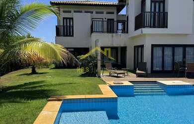 Imagem: A casa possui 4 Dormitórios, 5 Banheiros, 5 Vagas na garagem