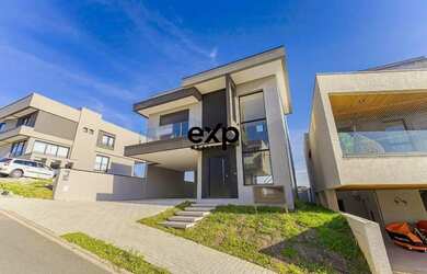 Imagem: A casa em condomínio possui 4 Dormitórios, 5 Banheiros, 4