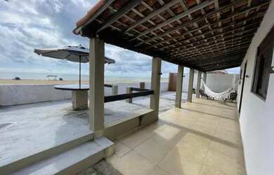 Imagem: A casa possui 3 Dormitórios, 4 Banheiros, 5 Vagas na garagem