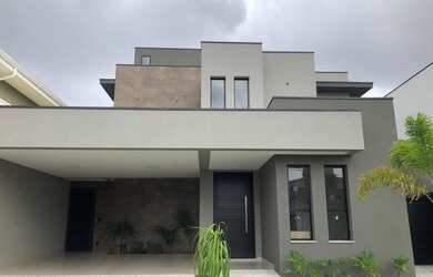 Imagem: A casa possui 3 Dormitórios, 5 Banheiros, 4 Vagas na garagem