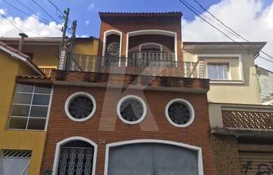 Imagem: A casa possui 3 Dormitórios, 3 Banheiros, 3 Vagas na garagem