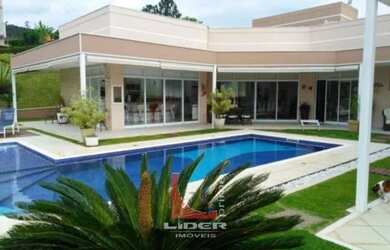 Imagem: A casa em condomínio possui 5 Dormitórios, 5 Banheiros, 5