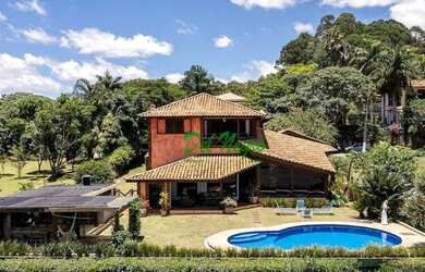 Imagem: A casa em condomínio possui 4 Dormitórios, 5 Banheiros, 5