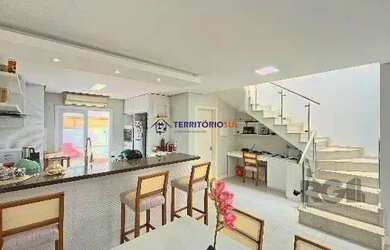 Imagem 14: Casa em Porto Alegre, no bairro Hípica, com 3 dormitório s , e 3 banheiros,...