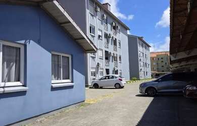 Imagem: O apartamento possui 3 Dormitórios, 1 Banheiro, 1 Vaga na garagem