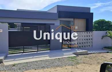 Imagem: A casa possui 3 Dormitórios, 2 Banheiros, 3 Vagas na garagem