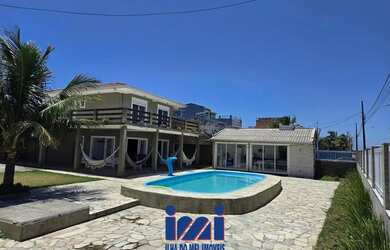 Imagem: A casa possui 5 Dormitórios, 3 Banheiros, 5 Vagas na garagem