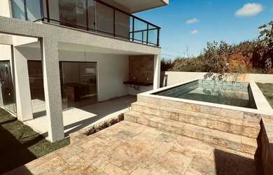 Imagem: A casa em condomínio possui 3 Dormitórios, 4 Banheiros, 2