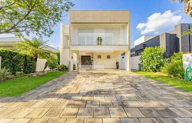 Imagem: A casa em condomínio possui 3 Dormitórios, 3 Banheiros, 2