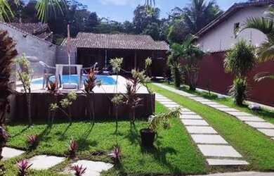 Imagem: A casa possui 3 Dormitórios e 4 Vagas na garagem e está localizado