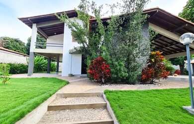 Imagem: A casa possui 4 Dormitórios, 5 Banheiros, 5 Vagas na garagem