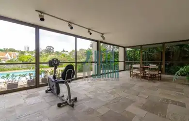 Imagem: A casa em condomínio possui 4 Dormitórios, 5 Banheiros, 5