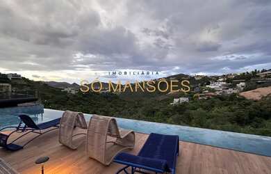 Imagem: A casa possui 5 Dormitórios, 5 Banheiros, 5 Vagas na garagem