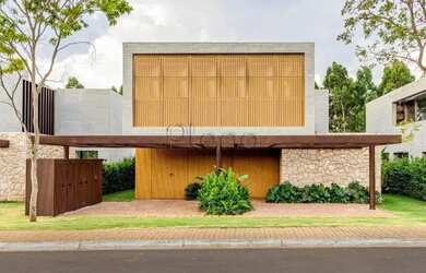 Imagem: A casa em condomínio possui 4 Dormitórios, 5 Banheiros, 5