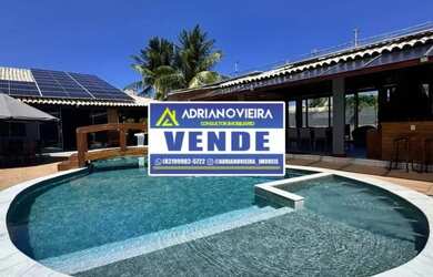 Imagem: A casa possui 4 Dormitórios, 5 Banheiros, 3 Vagas na garagem